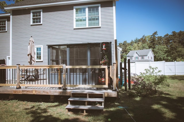 7 Plum St, Concord, NH 03301 - back of house featuring a deck, a sunroom, and roof with shingles