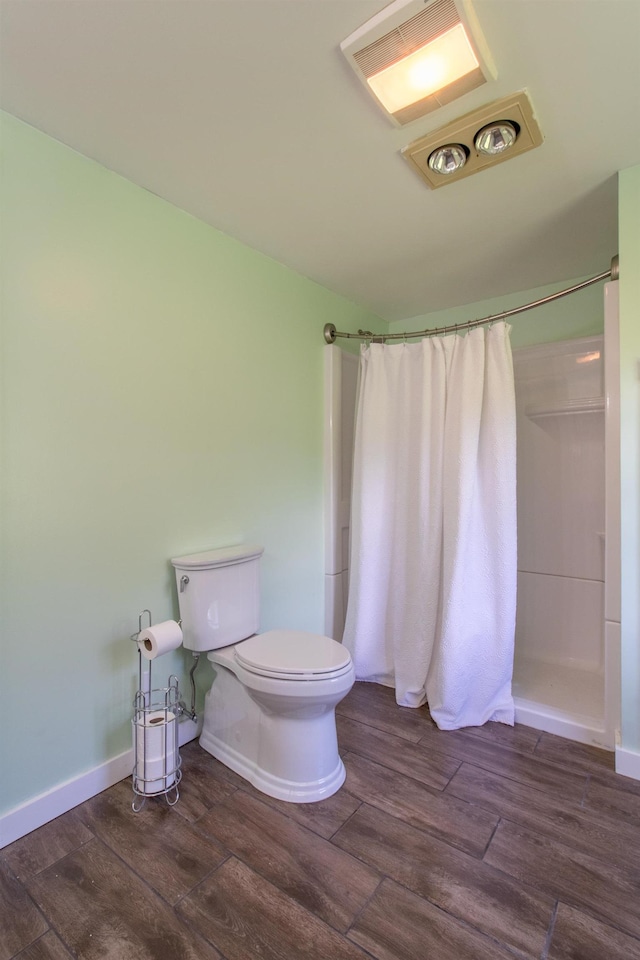 2147 Vt Route 111, Derby, VT 05829 - bathroom featuring a shower stall, wood finished floors, toilet, and baseboards