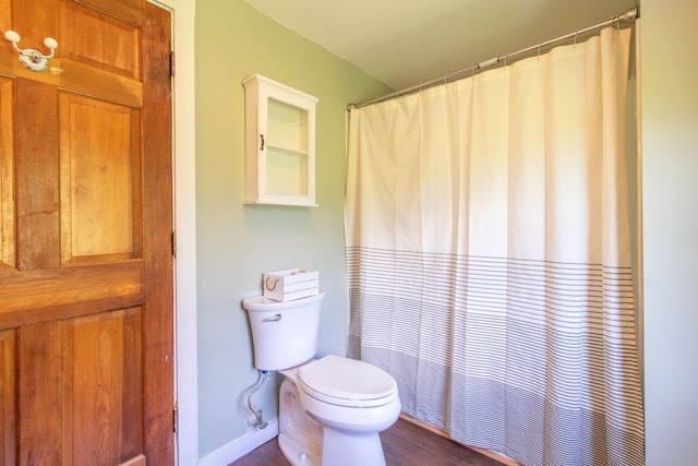 2147 Vt Route 111, Derby, VT 05829 - full bath featuring toilet, wood finished floors, and curtained shower