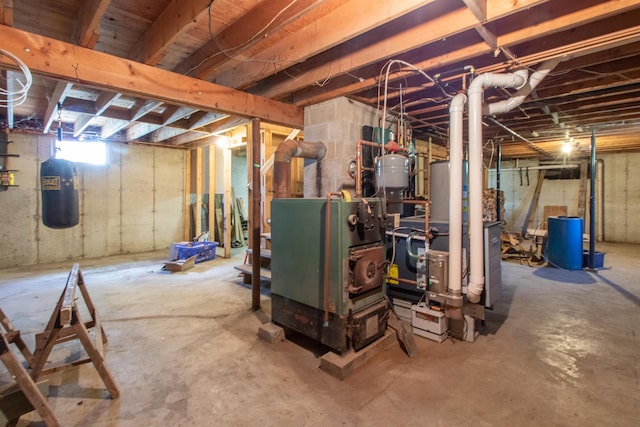 2147 Vt Route 111, Derby, VT 05829 - basement with a water pressure tank and a heating unit