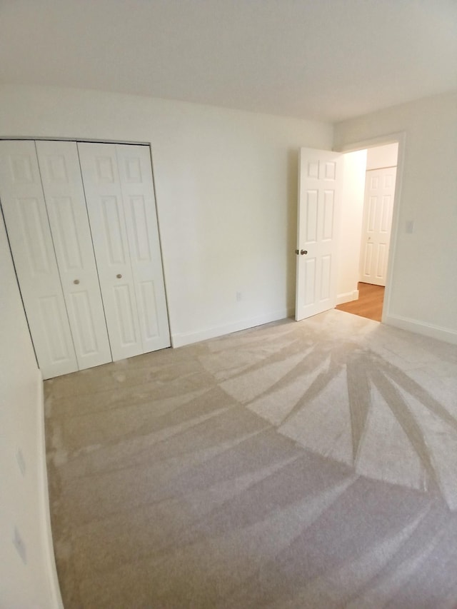 37 Alice Dr Unit 18, Concord, NH 03303 - unfurnished bedroom featuring carpet flooring, baseboards, and a closet