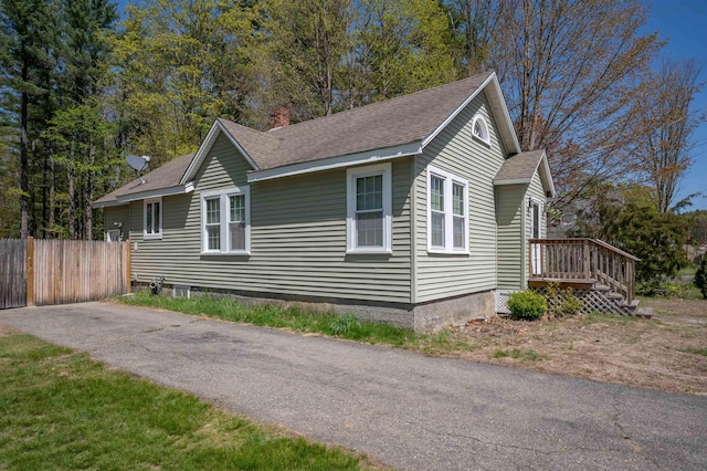 4 Palmer Ave, Plaistow, NH 03865 - view of home's exterior featuring a shingled roof