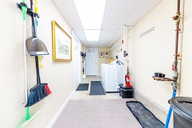 107 Artist Falls Rd, Conway, NH 03860 - laundry area with washer and clothes dryer and tile patterned floors