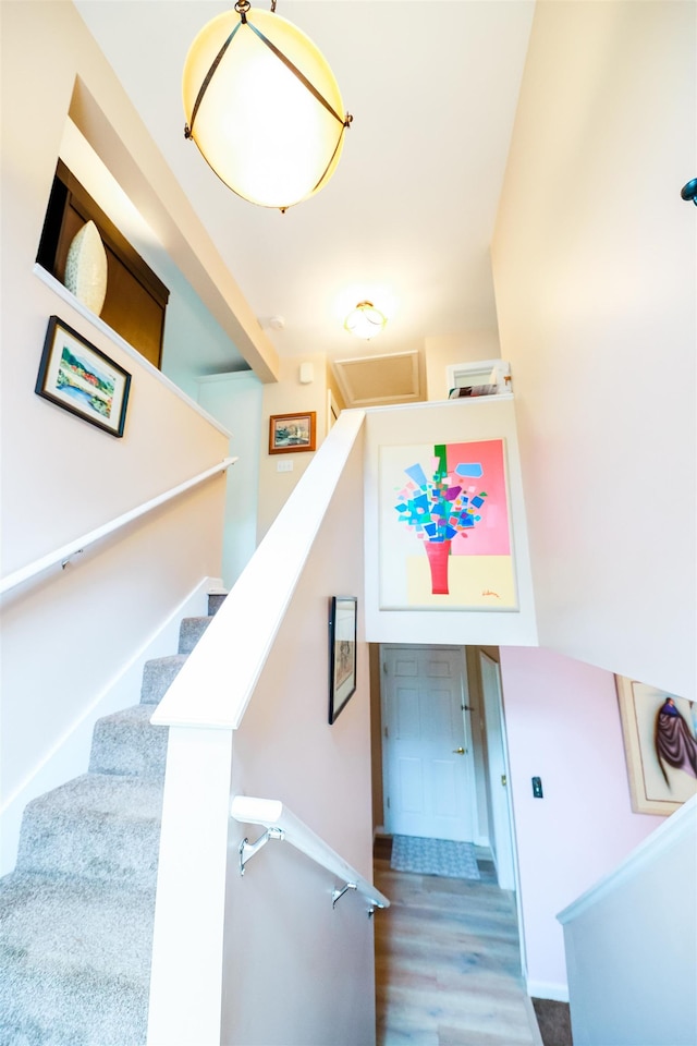107 Artist Falls Rd, Conway, NH 03860 - stairs featuring wood finished floors