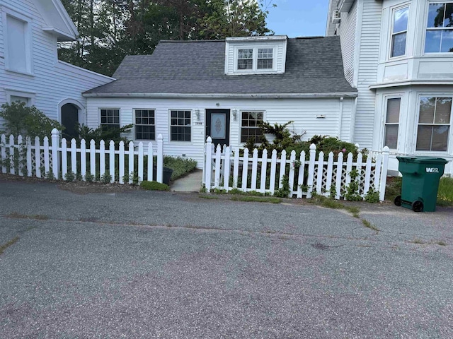 154B Main St, Kingston, NH 03848 - view of front of home featuring roof with shingles