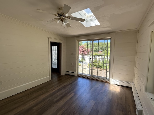 154B Main St, Kingston, NH 03848 - spare room with a baseboard heating unit, a skylight, dark wood-type flooring, crown molding, and a ceiling fan