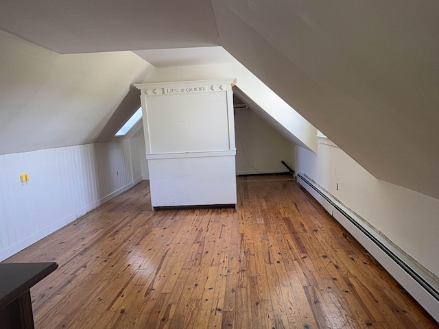 154B Main St, Kingston, NH 03848 - bonus room featuring a baseboard heating unit, hardwood / wood-style floors, and lofted ceiling