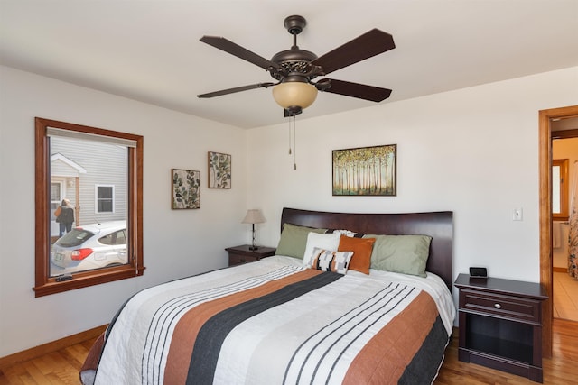 49 Morgan St, Burlington, VT 05408 - bedroom with wood finished floors, baseboards, and a ceiling fan
