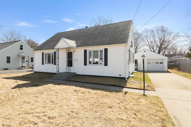 49 Morgan St, Burlington, VT 05408 - view of front of home with roof with shingles, an outdoor structure, and a garage