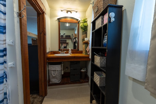 18 State St, Northumberland, NH 03582 - corridor with a sink and tile patterned floors