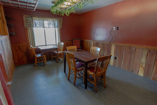 18 State St, Northumberland, NH 03582 - dining space featuring a wainscoted wall and wood walls