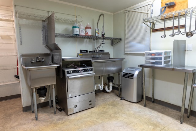 18 State St, Northumberland, NH 03582 - kitchen with ornamental molding, stove, a sink, tile patterned floors, and baseboards