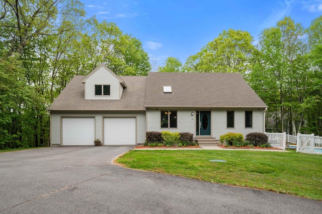 11 Sledding Hill Ln, Lee, NH 03861 - cape cod home featuring driveway, an attached garage, and a shingled roof