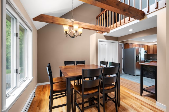 11 Sledding Hill Ln, Lee, NH 03861 - dining area featuring a chandelier, lofted ceiling, light wood-style flooring, a baseboard heating unit, and recessed lighting