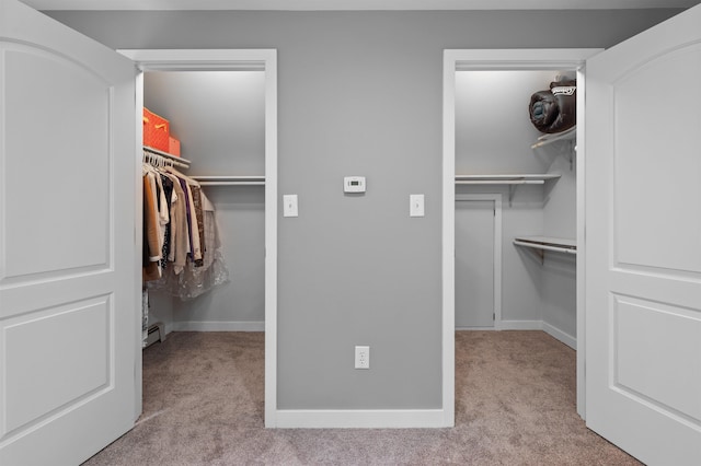 11 Sledding Hill Ln, Lee, NH 03861 - spacious closet featuring carpet and a baseboard heating unit