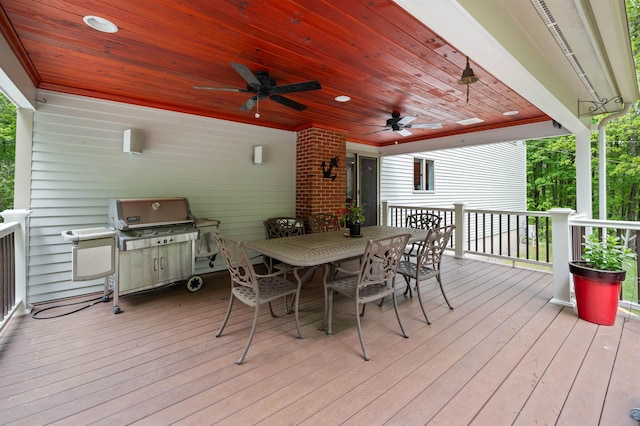 11 Sledding Hill Ln, Lee, NH 03861 - wooden terrace with ceiling fan and outdoor dining area