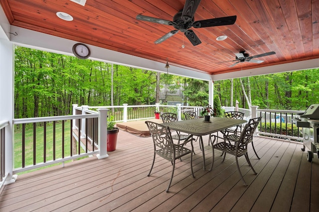 11 Sledding Hill Ln, Lee, NH 03861 - wooden terrace with ceiling fan, outdoor dining space, and a grill
