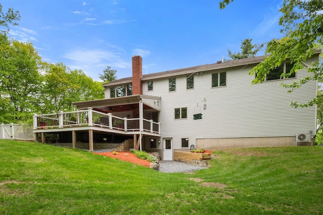 11 Sledding Hill Ln, Lee, NH 03861 - back of property featuring a wooden deck, a chimney, and ceiling fan