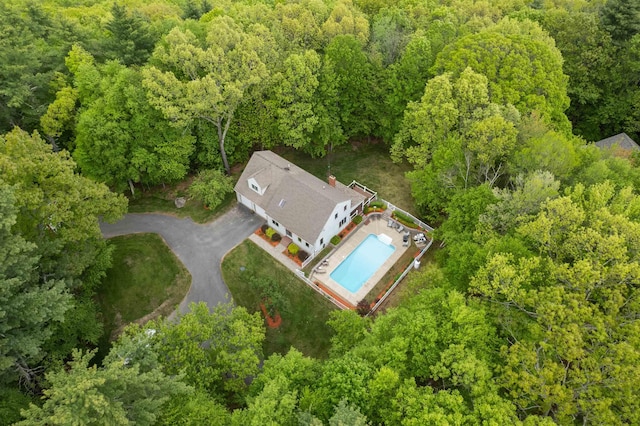 11 Sledding Hill Ln, Lee, NH 03861 - view of subject property with a heavily wooded area and a pool area