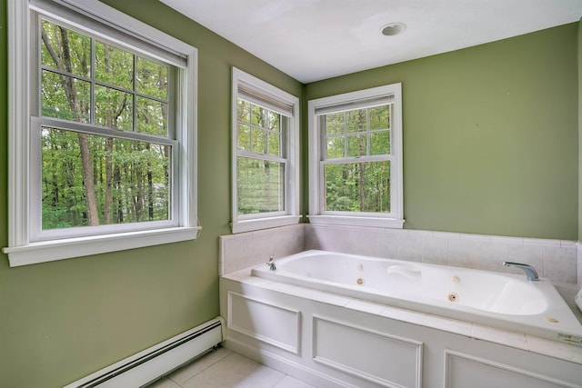 185 Whitford St, Manchester, NH 03104 - full bath with a baseboard heating unit, a whirlpool tub, and tile patterned flooring