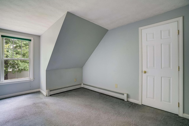 185 Whitford St, Manchester, NH 03104 - bonus room featuring carpet, baseboards, a textured ceiling, and lofted ceiling