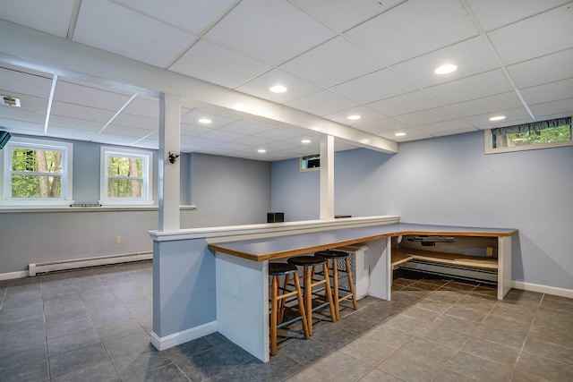 185 Whitford St, Manchester, NH 03104 - kitchen with a baseboard heating unit, baseboards, a drop ceiling, and recessed lighting