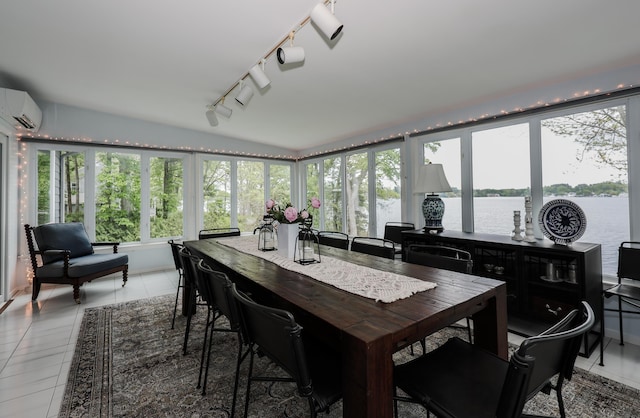 28 Woodvue Rd, Windham, NH 03087 - sunroom with a wall mounted AC, rail lighting, a water view, lofted ceiling, and tile patterned flooring