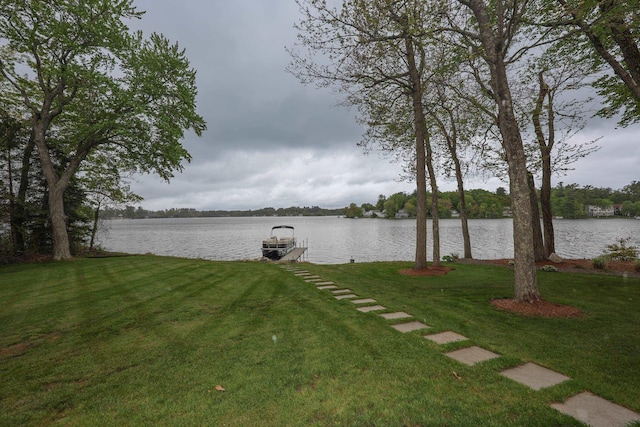 28 Woodvue Rd, Windham, NH 03087 - view of green lawn featuring a dock, a water view, and boat lift