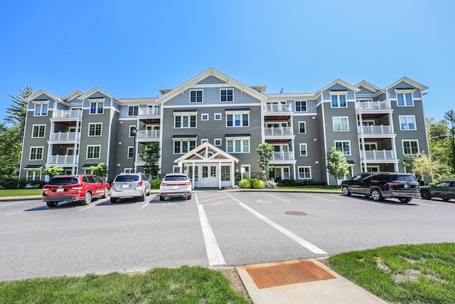7 Willey Creek Rd Unit 405, Exeter, NH 03833 - view of apartment building / complex featuring uncovered parking
