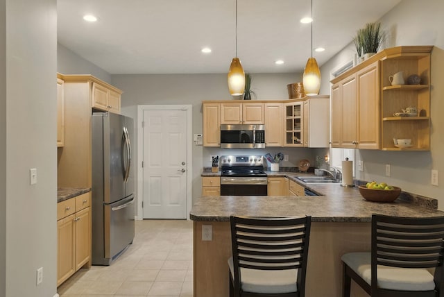 9 Swenson Rd, Bedford, NH 03110 - kitchen featuring stainless steel appliances, light brown cabinetry, a peninsula, a sink, and recessed lighting