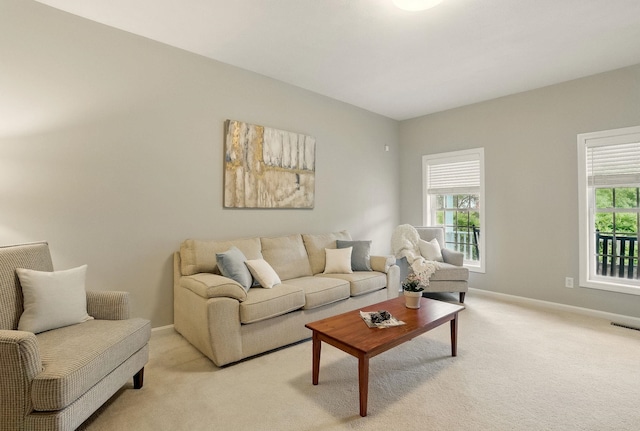 9 Swenson Rd, Bedford, NH 03110 - living room featuring light carpet and baseboards