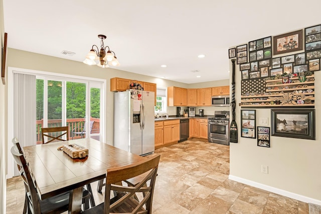 1191 Beech Ridge Rd, North Berwick, ME 03906 - dining space featuring a chandelier, baseboards, and recessed lighting