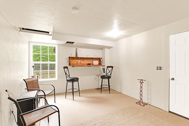1191 Beech Ridge Rd, North Berwick, ME 03906 - sitting room with concrete flooring