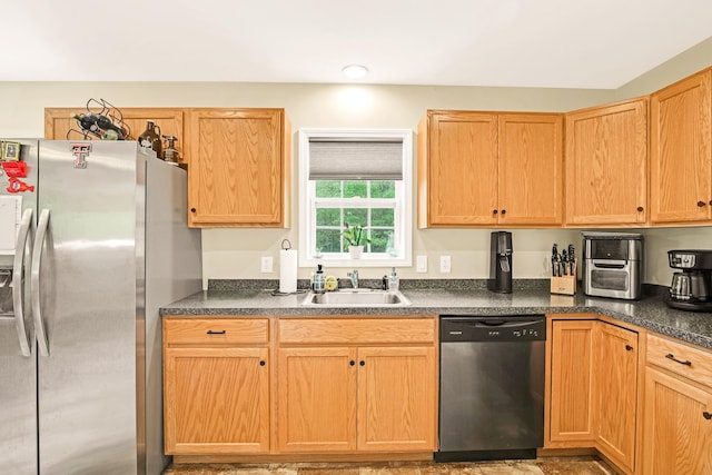 1191 Beech Ridge Rd, North Berwick, ME 03906 - kitchen with appliances with stainless steel finishes, a sink, dark countertops, and light brown cabinets