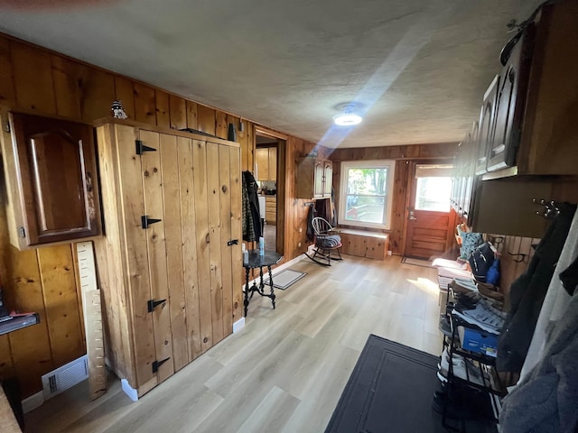 14 Brierwood Ln, Burlington, VT 05408 - living area featuring wooden walls and light wood finished floors