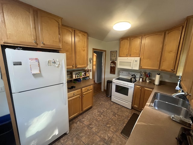 14 Brierwood Ln, Burlington, VT 05408 - kitchen with white appliances, a sink, and dark tile patterned flooring