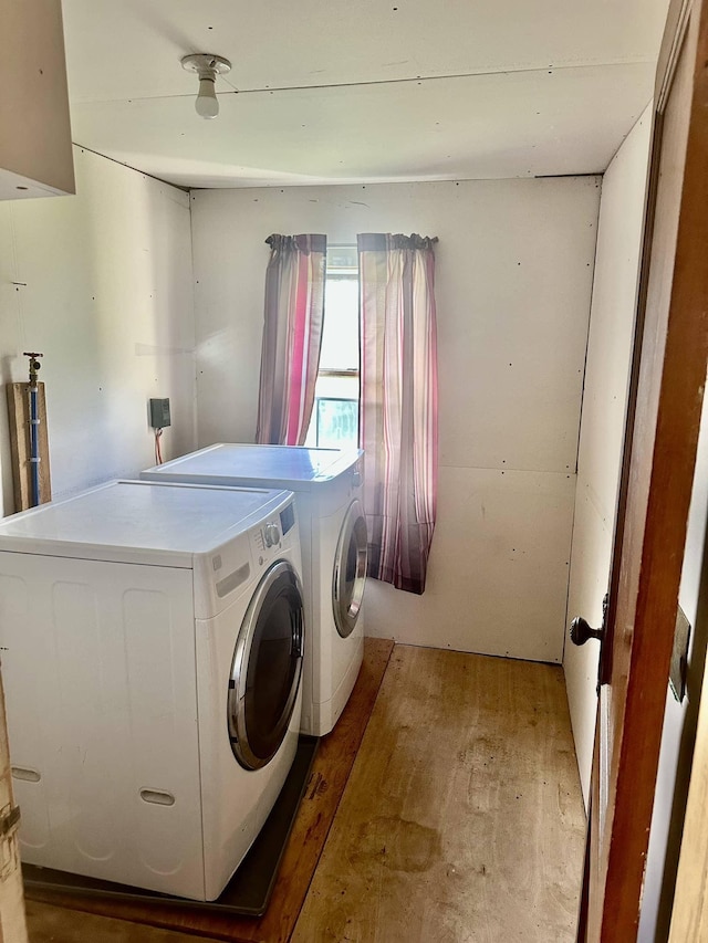 3342 E Hill Rd, Wolcott, VT 05680 - laundry area with independent washer and dryer and light wood finished floors