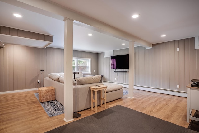 104 Lodge St, Manchester, NH 03104 - living room featuring wood finished floors, decorative columns, and recessed lighting
