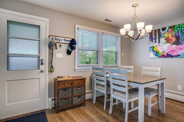 104 Lodge St, Manchester, NH 03104 - dining space with a chandelier and wood finished floors