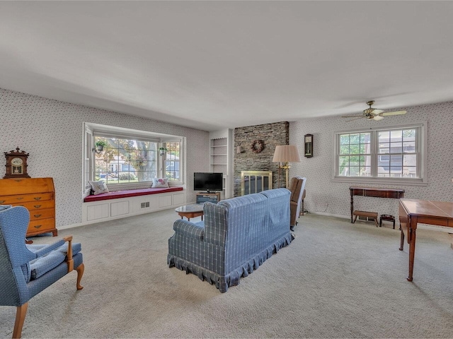 154 Birchcliff Pkwy, Burlington, VT 05041 - carpeted living area with wallpapered walls and a ceiling fan