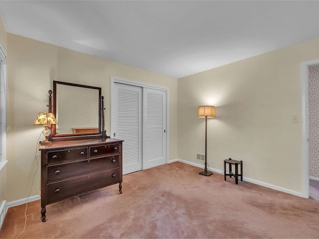 154 Birchcliff Pkwy, Burlington, VT 05041 - bedroom with carpet, a closet, and baseboards