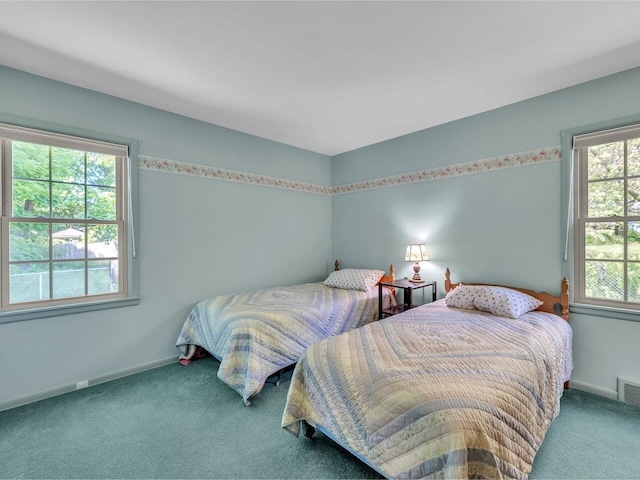 154 Birchcliff Pkwy, Burlington, VT 05041 - carpeted bedroom featuring baseboards