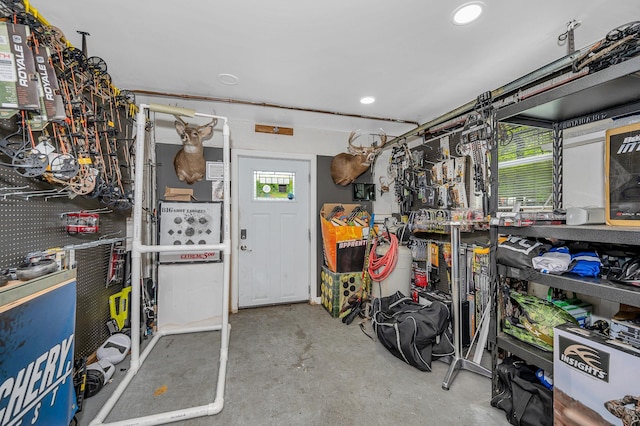 28 Hardy Rd, Londonderry, NH 03053 - garage with a workshop area and recessed lighting