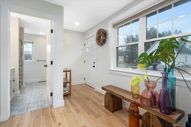 140 S Mast St, Goffstown, NH 03045 - entryway with light wood-style flooring, baseboards, and recessed lighting