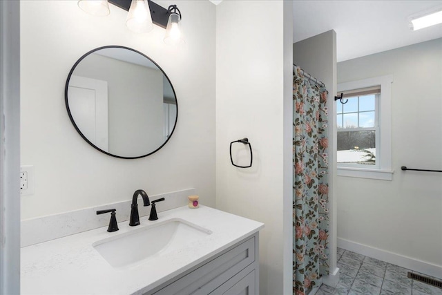 140 S Mast St, Goffstown, NH 03045 - full bath with vanity, baseboards, a shower with curtain, and marble look tiles