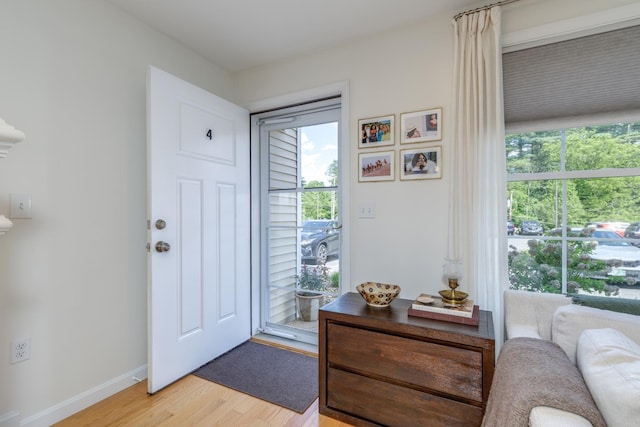 37 Highland Ave Unit 4, Derry, NH 03038 - entryway featuring light wood-style floors and baseboards