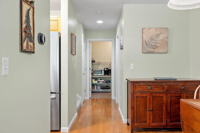 19 Steeple Chase Dr, Hampstead, NH 03841 - corridor with light wood-style floors and baseboards