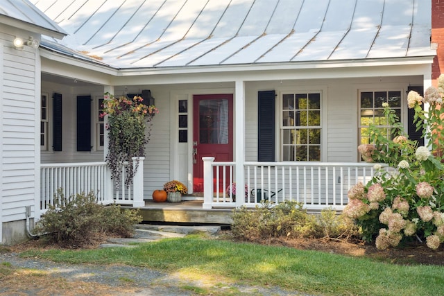 9671 Vt Route 12, Barnard, VT 05031 - view of exterior entry featuring a standing seam roof, covered porch, and metal roof
