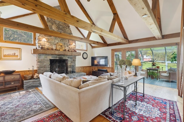9671 Vt Route 12, Barnard, VT 05031 - living room with a wainscoted wall, a fireplace, high vaulted ceiling, beamed ceiling, and wood finished floors