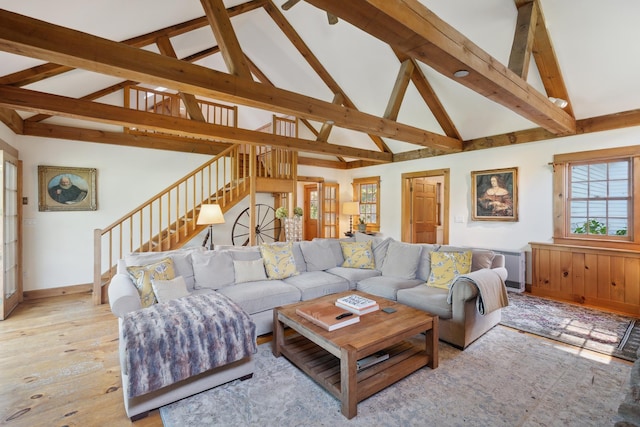9671 Vt Route 12, Barnard, VT 05031 - living room with stairway, beamed ceiling, hardwood / wood-style floors, baseboards, and high vaulted ceiling